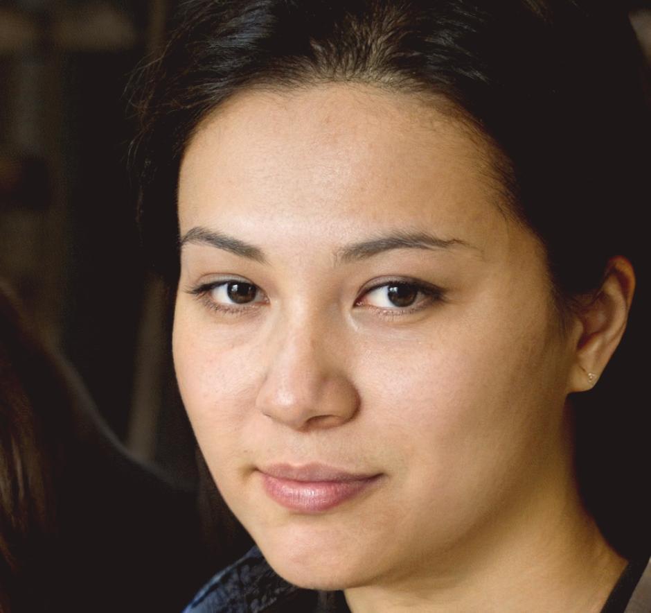 Evanthia Bakos reviewing company reports